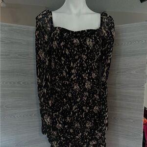 Chic Black and Cream Patterned Dress